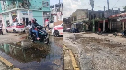 Aguas negras inundan calles de Nanchital; vecinos exigen solución a autoridades